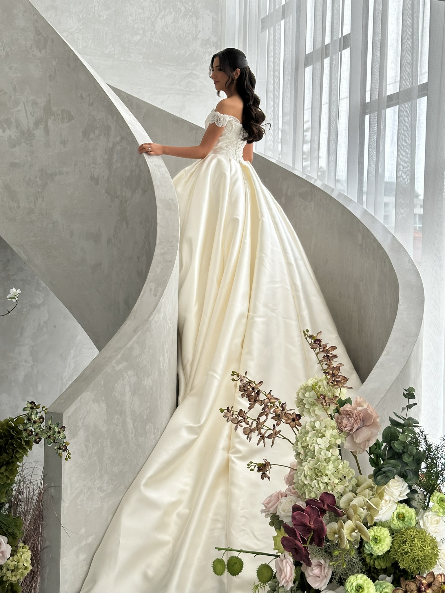 Bride in veil and fitted gown