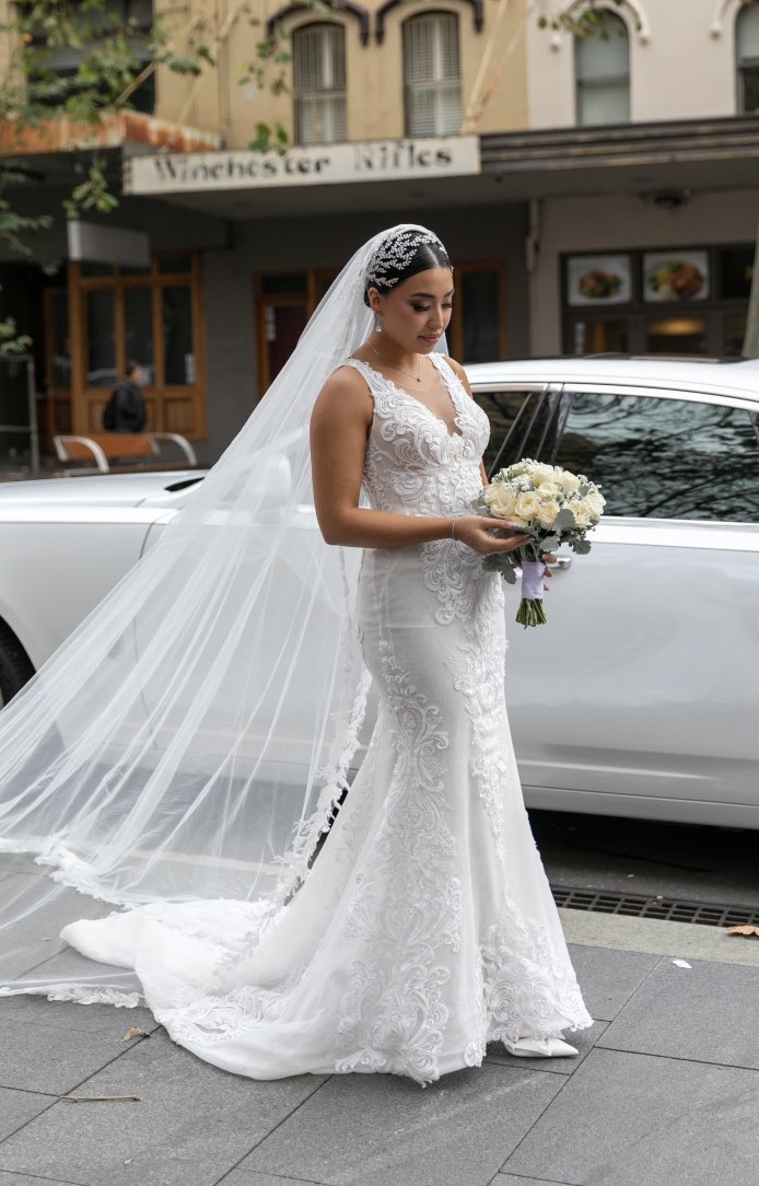 Bride in boutique fitting moment